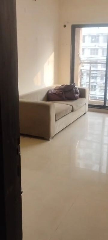 Living Room in 2 BHK Apartment at Evershine Embassy, Andheri West – for Rent