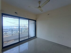 Room in 1 BHK Apartment at Tulsi Aura Mumbai, Ghansoli – for Rent