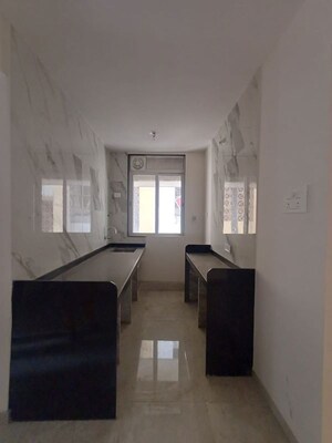 Kitchen in 1 BHK Apartment at Naupada – for Sale