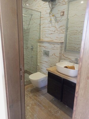 Bathroom in 3 BHK Builder Floor at Kalkaji – for Rent