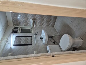 Bathroom in 2 BHK Apartment at Antriksh Golf View, Sector 78 – for Rent