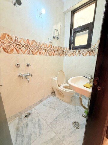 Bathroom in 2.5 BHK Builder Floor at Chattarpur – for Rent