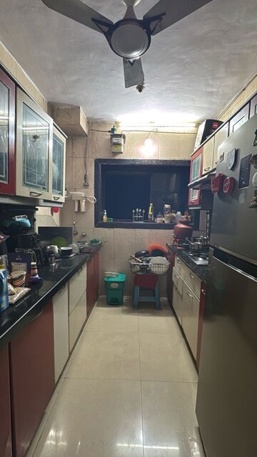 Kitchen in 2 BHK Apartment at Yashodham Complex, Goregaon East – for Sale