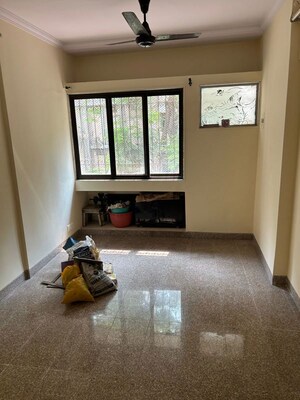 Living Room in 1 BHK Apartment at Vrindavan CHS Malad, Malad East – for Sale