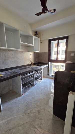 Kitchen in 2 BHK Apartment at DGS Sheetal Anupam, Malad West – for Sale