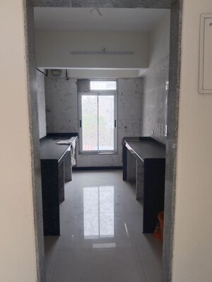 Kitchen in 2 BHK Apartment at DGS Sheetal Anupam, Malad West – for Sale