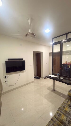 Living Room in 1 BHK Apartment at Lodha Crown Quality Homes, Majiwada – for Rent