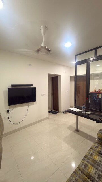 Living Room in 1 BHK Apartment at Lodha Crown Quality Homes, Majiwada – for Rent