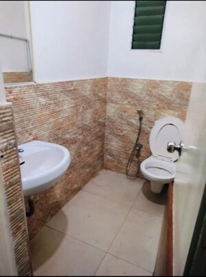 Bathroom in  Office Space at Goyal Synergy Tower, Makarba – for Rent