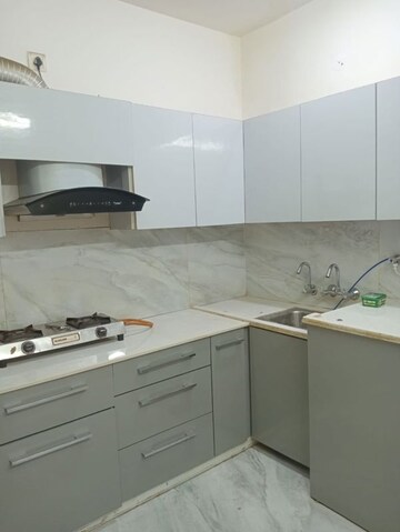 Kitchen in 2 BHK Apartment at Arun Vihar Sector 37, Sector 37 – for Rent