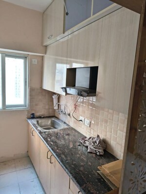 Kitchen in 1 BHK Apartment at Amrapali Dream Valley, Tech Zone 4 Greater Noida – for Rent