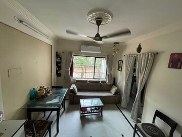 Living Room in 1 BHK Apartment at Akanksha CHS, Malad West – for Sale