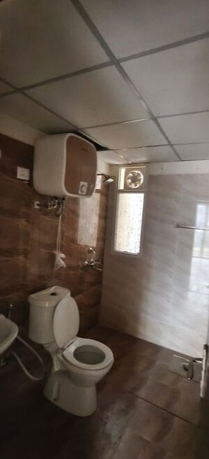 Bathroom in 3 BHK Apartment at Amrapali Crystal Homes, Sector 76 – for Rent