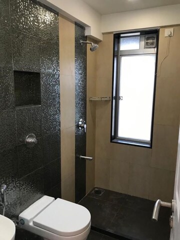 Bathroom in 2 BHK Apartment at Amal Aspen Park, Goregaon East – for Rent