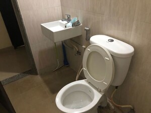 Bathroom in 3 BHK Apartment at Kumar Urban Kul Ecoloch, Mahalunge – for Rent