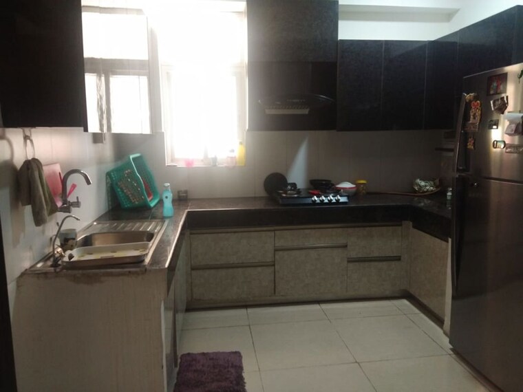 Kitchen, ajnara-klock-tower 3 Bedroom 1295 Sq.Ft. Apartment In Sector 74 Noida 10010179