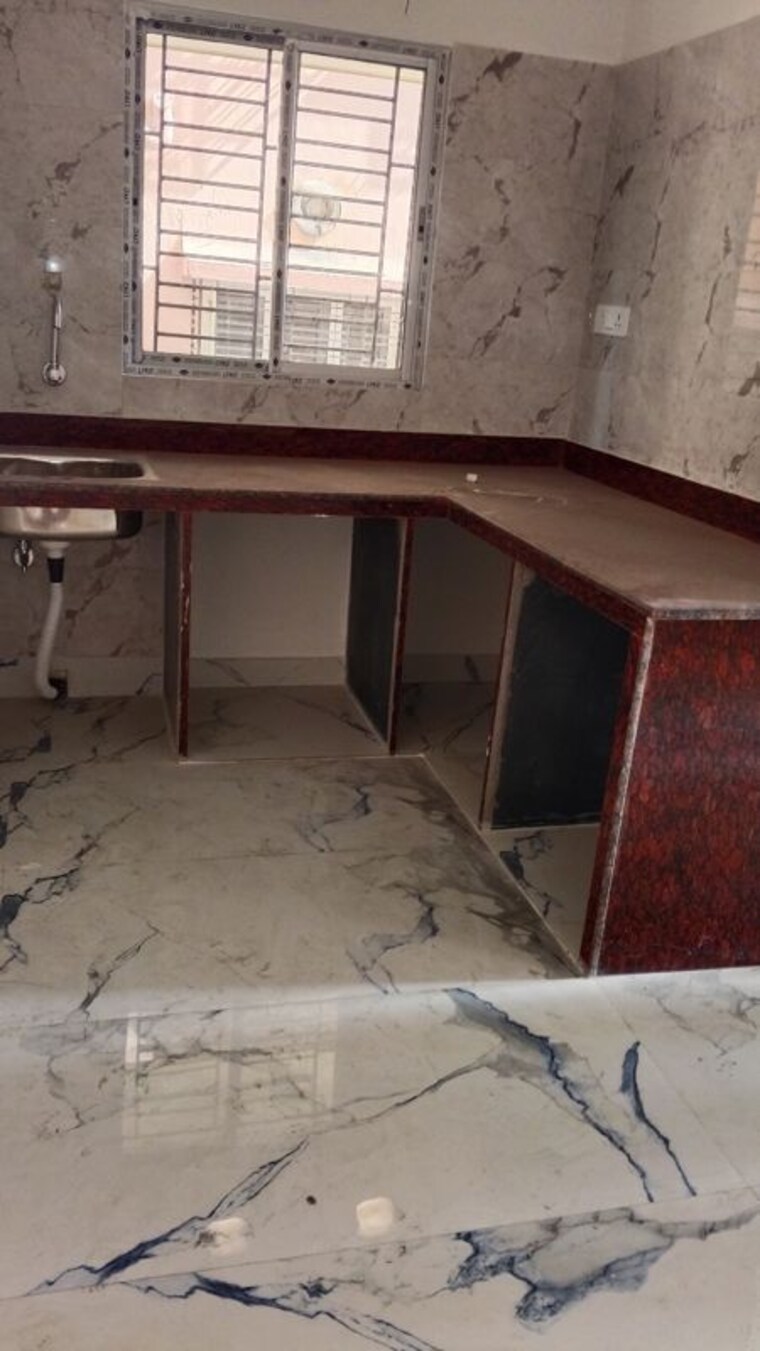 Kitchen, sristi-plaza 2 Bedroom 870 Sq.Ft. Apartment In Chinar Park Kolkata 10010210