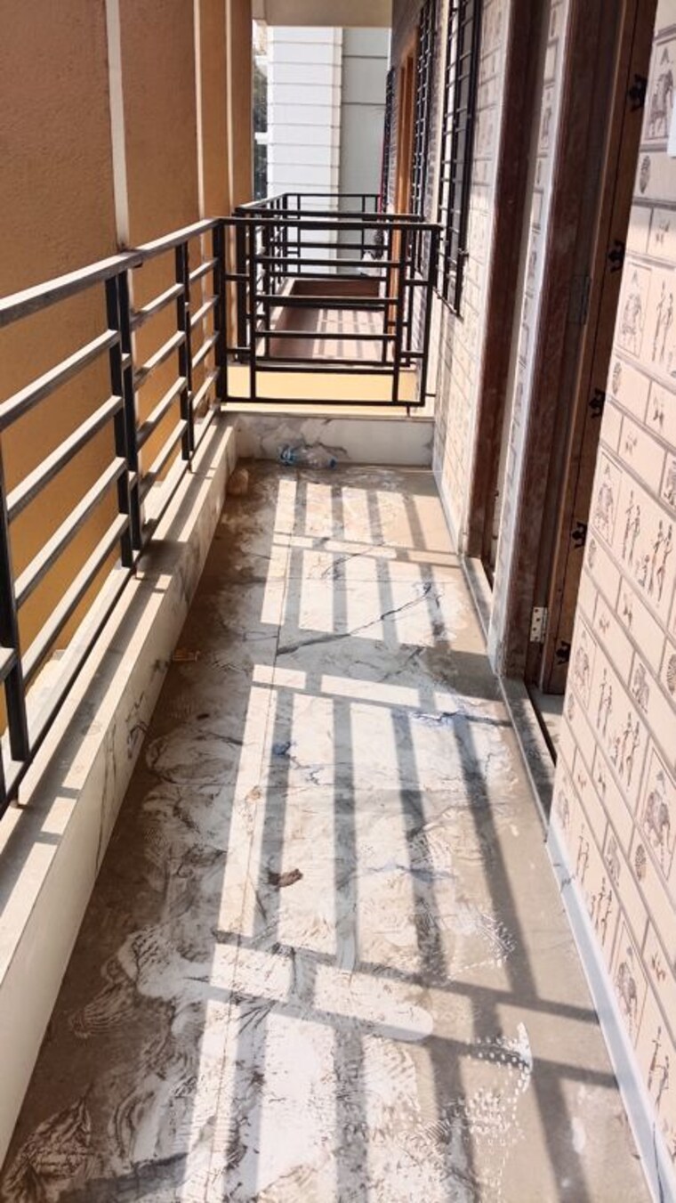 Balcony, sristi-plaza 2 Bedroom 870 Sq.Ft. Apartment In Chinar Park Kolkata 10010210