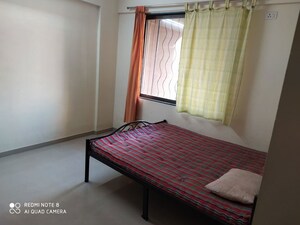Bedroom in 2 BHK Apartment at Kumar Urban Kul Ecoloch, Mahalunge – for Sale