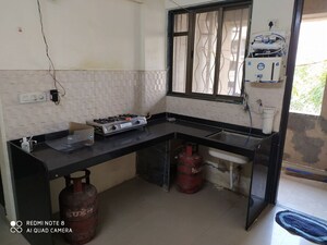 Kitchen in 2 BHK Apartment at Kumar Urban Kul Ecoloch, Mahalunge – for Sale