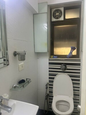 Bathroom in 1 BHK Apartment at Omkar Raga, Chembur – for Rent