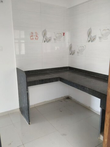 Kitchen in 2 BHK Apartment at Wadgaon Sheri – for Rent