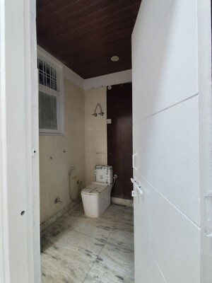 Bathroom in 4 BHK Builder Floor at Nest Floor I, Green Fields Colony – for Rent