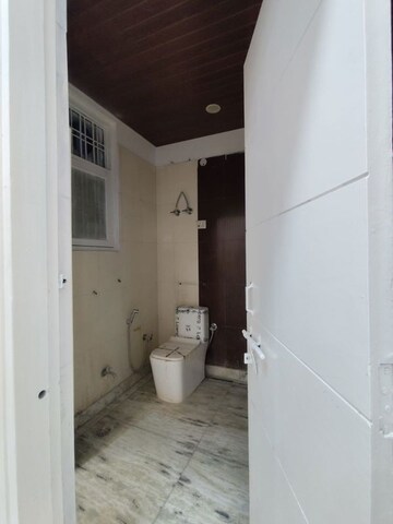 Bathroom in 4 BHK Builder Floor at Nest Floor I, Green Fields Colony – for Rent