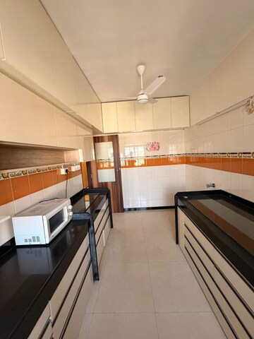 Kitchen in 2 BHK Apartment at Rag Megh Malhar, Goregaon East – for Rent