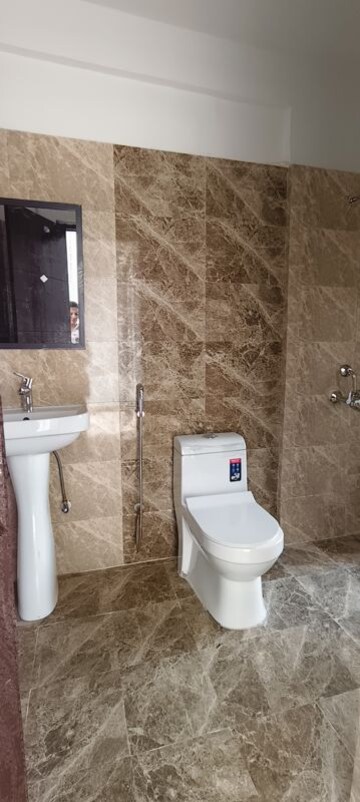 Bathroom in 2 BHK Apartment at Prateek Grand City, Siddharth Vihar – for Rent