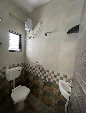 Bathroom in 1 BHK Apartment at Wadgaon Sheri – for Rent