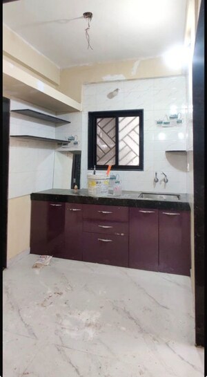 Kitchen in 1 BHK Apartment at Wadgaon Sheri – for Rent