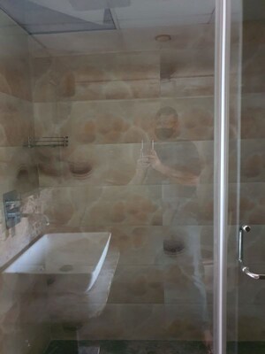 Bathroom in 4 BHK Apartment at Mahagun Maple, Sector 50 – for Rent