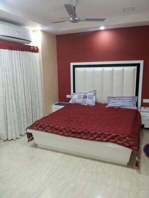 Bedroom in 4 BHK Apartment at Mahagun Maple, Sector 50 – for Rent