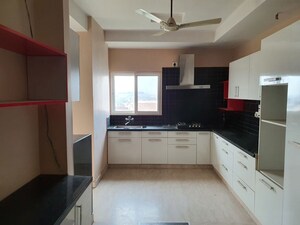 Kitchen in 4 BHK Apartment at Mahagun Maple, Sector 50 – for Rent