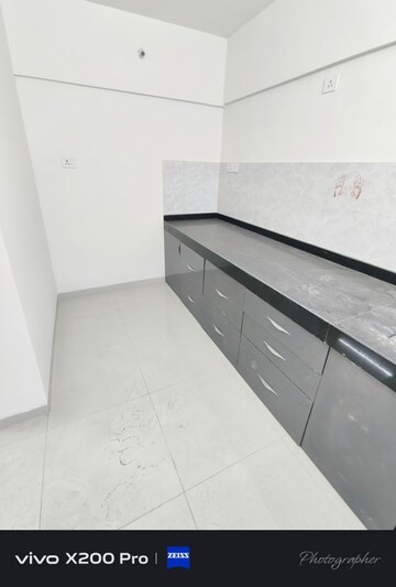 Kitchen in 2 BHK Apartment at Gurukrupa Astter, Wadgaon Sheri – for Rent