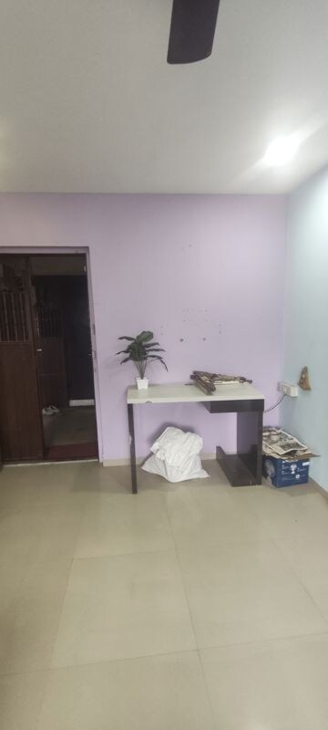 Living Room in 1 BHK Apartment at Runwal Tower, Uthalsar – for Rent