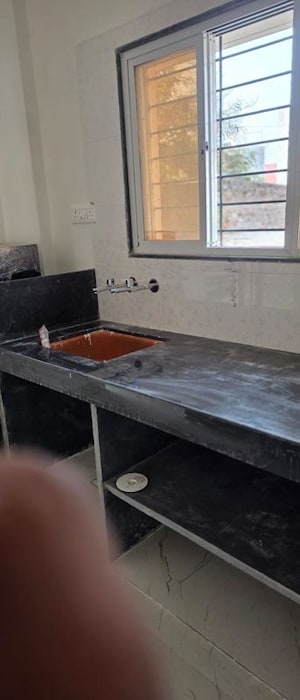 Kitchen in 1 BHK Apartment at Wadgaon Sheri – for Rent