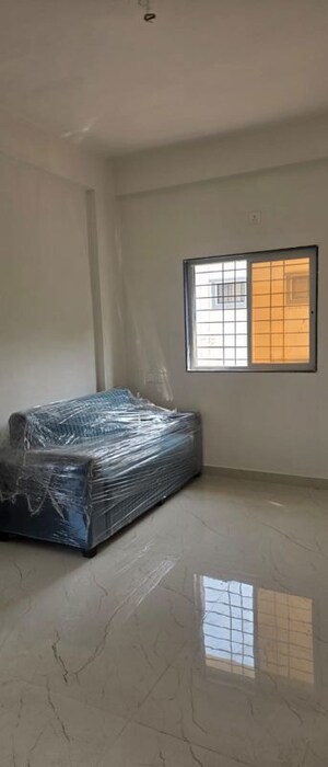 Living Room in 1 BHK Apartment at Wadgaon Sheri – for Rent