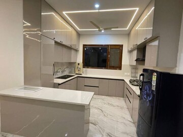 Kitchen in 3 BHK Apartment at Artique Uptown Skylla, International Airport Road – for Rent