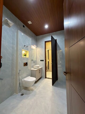 Bathroom in 3 BHK Apartment at Affinity Greens, International Airport Road – for Rent