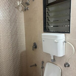 Bathroom in 1 BHK Apartment at Bhoomi Samarth C Wing, Sonawala Industry Estate – for Rent