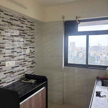 Kitchen in 1 BHK Apartment at Bhoomi Samarth C Wing, Sonawala Industry Estate – for Rent