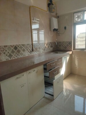 Kitchen in 2 BHK Apartment at Vardhman Grandeur, Andheri West – for Rent