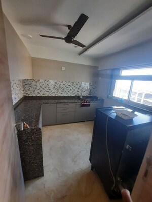 Kitchen in 1 BHK Apartment at Srishti Harmony 3 Phase 1, Andheri East – for Rent