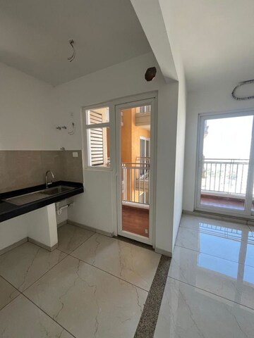 Living Room in 2 BHK Apartment at Rishita Manhattan, Gomti Nagar – for Sale