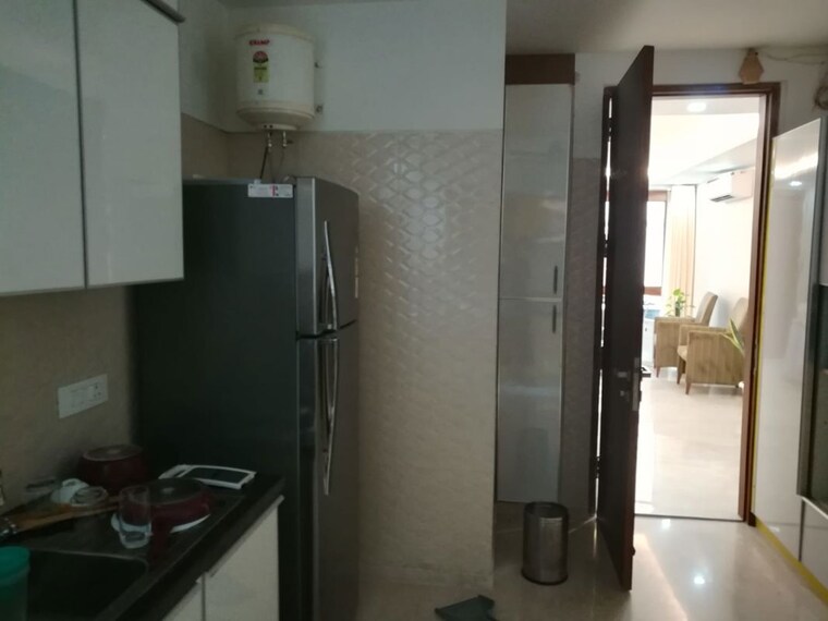 Kitchen, kailash colony 4 Bedroom 500 Sq.Yd. Builder Floor In Kailash Colony Delhi 10010978