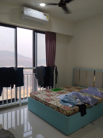 Bedroom in 2 BHK Apartment at Dynamix Divum, Malad East – for Rent