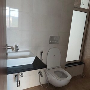 Bathroom in 1 BHK Apartment at Omkar Signet, Kasam Baug – for Rent