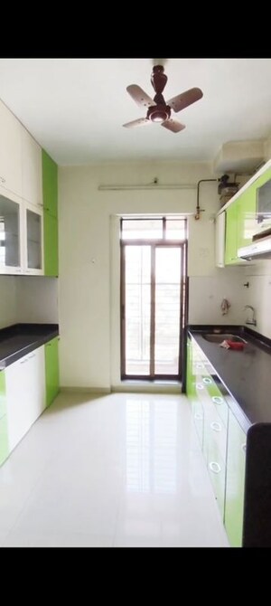 Kitchen in 2 BHK Apartment at Shree Satya Shankar Residency, Manpada – for Rent
